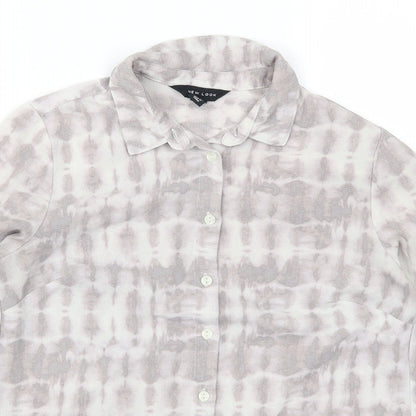 Close-up detail of New Look women’s purple basic button-up, size UK 10