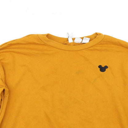 Close-up detail of H&M women’s orange jumper, size M