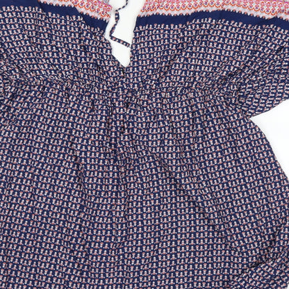 Brand and care label for Papaya women’s blue a-line, size L