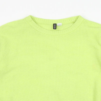 Close-up detail of Divided women’s green jumper, size M