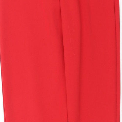 Brand and care label for PRETTYLITTLETHING women’s red trousers, size UK 4, 22-inch leg