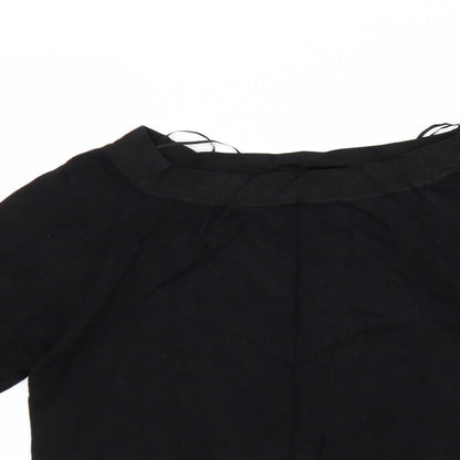 Close-up detail of Dunnes women’s black basic blouse, size L