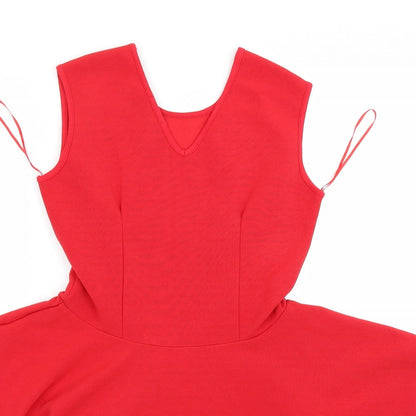Close-up detail of ribon women’s red tunic blouse, size UK 10