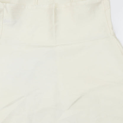 Brand and care label for Marks & Spencer women’s ivory basic blouse, size UK 10