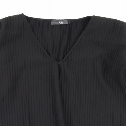 Close-up detail of Missguided women’s beige basic t-shirt, size UK 8