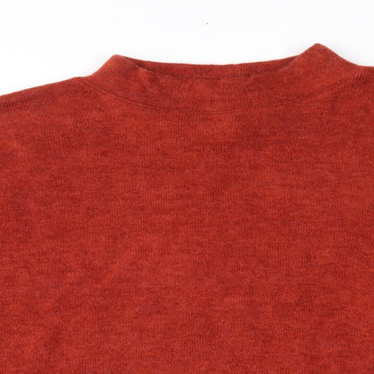 Close-up detail of H&M women’s orange jumper, size S