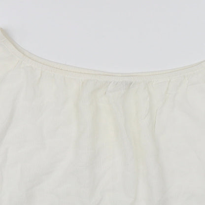 Close-up detail of Miss Selfridge women’s white basic blouse, size UK 12