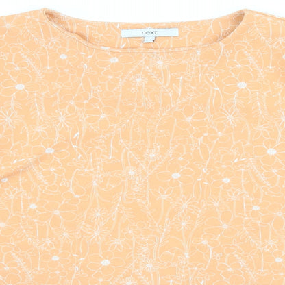 Close-up detail of Next women’s orange floral basic t-shirt, size UK 12