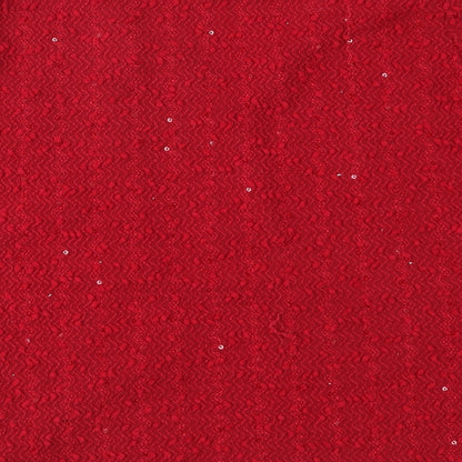 Brand and care label for Dorothy Perkins women’s red knit jumper, size UK 10