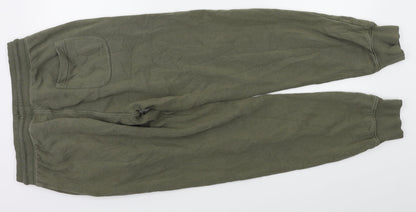 Back view of Next men’s gold jegging trousers, size S, 27-inch leg