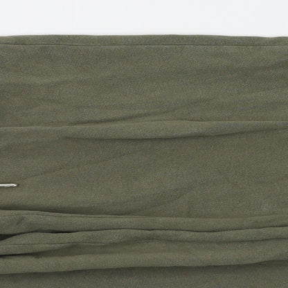Close-up detail of Next men’s gold jegging trousers, size S, 27-inch leg