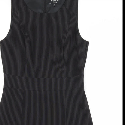 Close-up detail of Papaya women’s black striped a-line, size UK 12