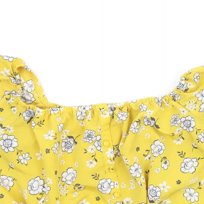 Close-up detail of New Look girls’ yellow floral basic blouse, size 13, years