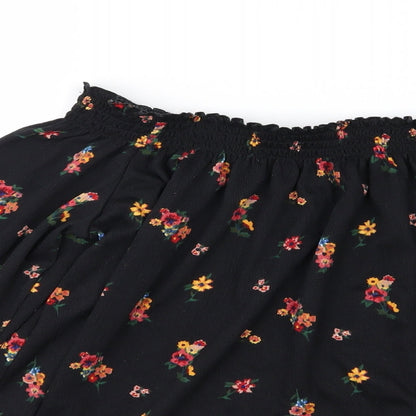 Close-up detail of Divided by H&M women’s black fair isle basic blouse, size M