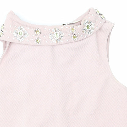 Close-up detail of Miss Selfridge women’s pink basic t-shirt, size UK 8