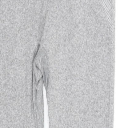 Brand and care label for WorkOut girls’ grey jegging trousers, size 14, years