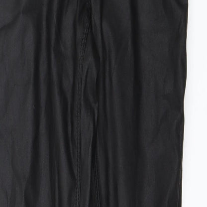 Close-up detail of women’s black mom jeans, size UK 6, 28-inch leg