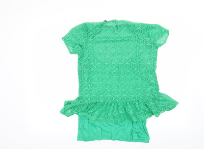 Back view of Dunnes women’s green geometric basic blouse, size UK 10