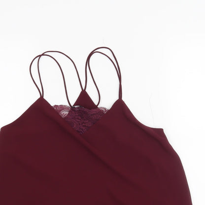 Close-up detail of New Look women’s red basic blouse, size UK 8