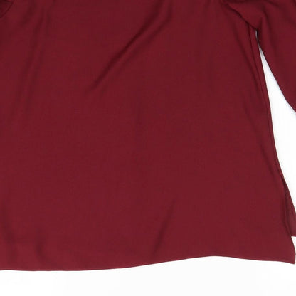 Brand and care label for River Island women’s purple basic blouse, size UK 8