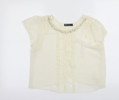 Front view of Internationale women’s ivory camisole blouse, size UK 10