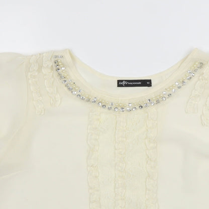 Close-up detail of Internationale women’s ivory camisole blouse, size UK 10