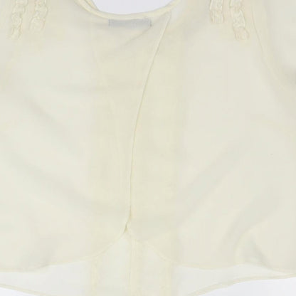 Brand and care label for Internationale women’s ivory camisole blouse, size UK 10