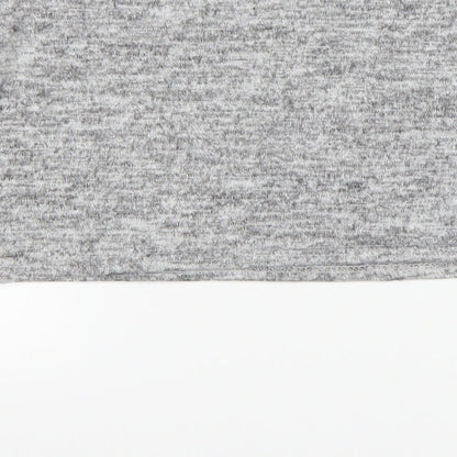 Brand and care label for PRETTYLITTLETHING women’s grey jumper, size UK 10