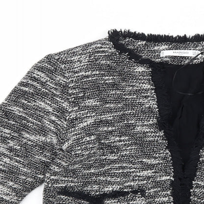 Close-up detail of Mango women’s black jacket, size S