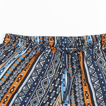 Close-up detail of Select women’s blue geometric hot pants shorts, size UK 12