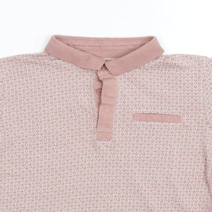 Close-up detail of Undeniable Dudes boys’ pink geometric basic polo, size 11, years