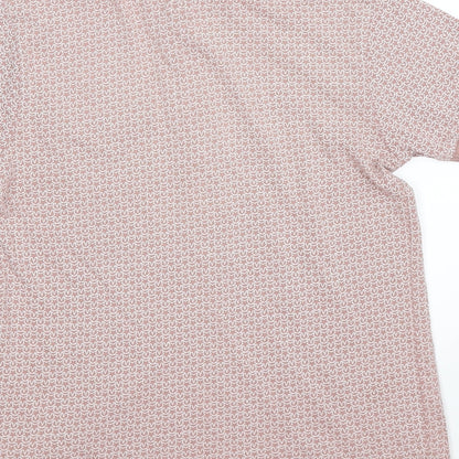 Brand and care label for Undeniable Dudes boys’ pink geometric basic polo, size 11, years