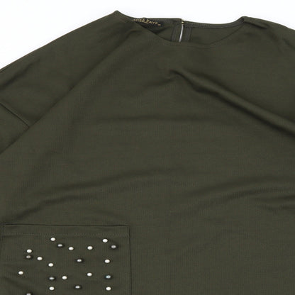 Close-up detail of Miss Payne women’s green jersey basic t-shirt, size UK 10