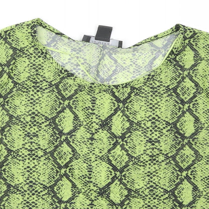 Close-up detail of Primark women’s green animal print basic blouse, size M