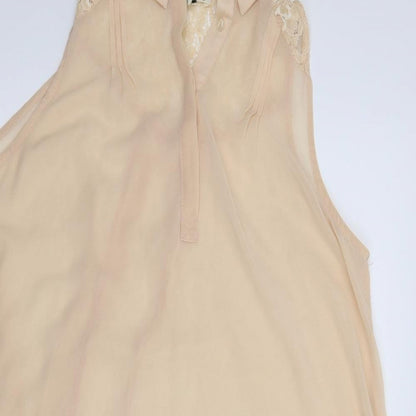 Close-up detail of River Island women’s pink basic blouse, size UK 10
