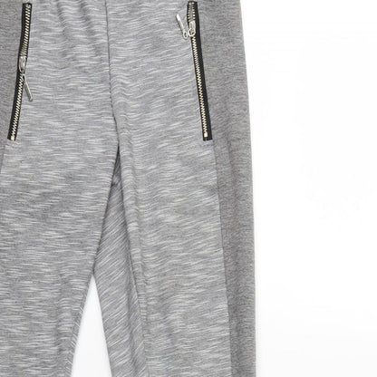 Close-up detail of Schocolet women’s gold sweatpants, size M, 28-inch leg