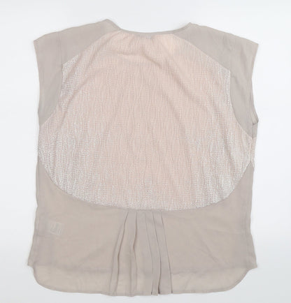 Back view of Oasis women’s beige basic tank, size M
