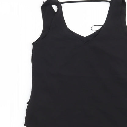 Brand and care label for Oasis women’s black basic blouse, size UK 8