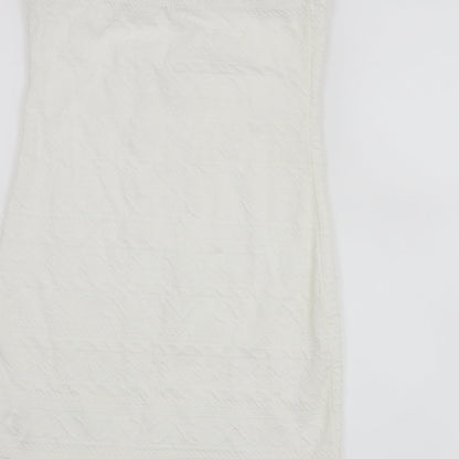 Brand and care label for Atmosphere women’s white basic tank, size UK 12