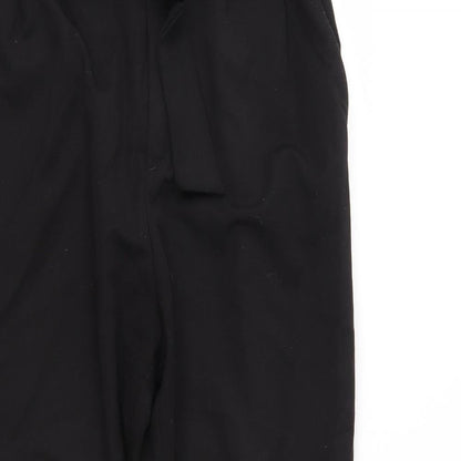 Close-up detail of H&M women’s black trousers, size UK 10, 24-inch leg