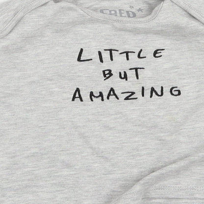 Brand and care label for F&F boys’ grey basic t-shirt, size 3-6, months
