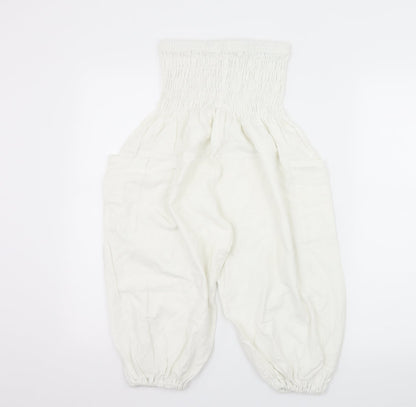 Back view of Preworn women’s white rayon bermuda shorts, size UK 30, in