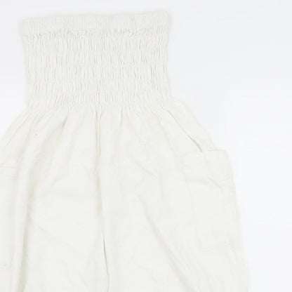 Close-up detail of Preworn women’s white rayon bermuda shorts, size UK 30, in