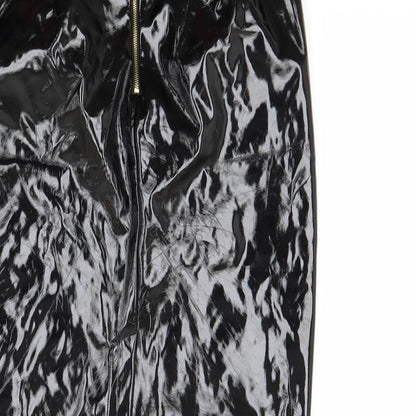 Brand and care label for Topshop women’s black a-line skirt, size UK 10