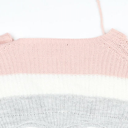Close-up detail of quix girls’ white striped jumper, size S