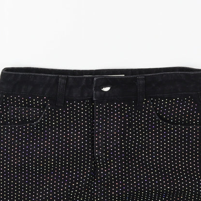Close-up detail of Topshop women’s black denim mini skirt, size UK 8