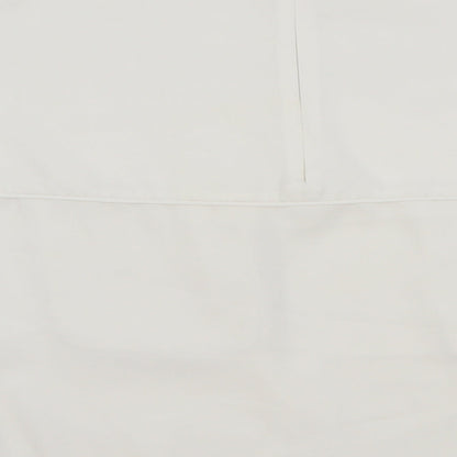 Brand and care label for Sfera women’s white basic blouse, size M