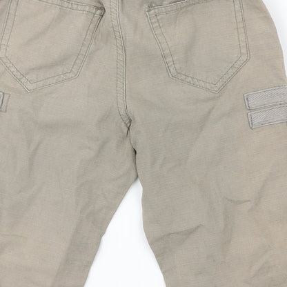 Brand and care label for Rebel Jr boys’ beige cargo shorts, size 4-5, years