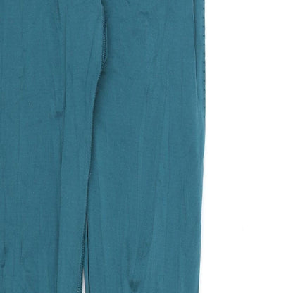 Brand and care label for Preworn women’s blue compression leggings, 27-inch leg