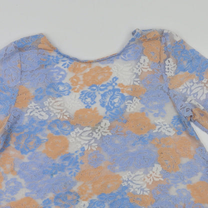 Close-up detail of River Island women’s multicoloured floral basic t-shirt, size UK 10